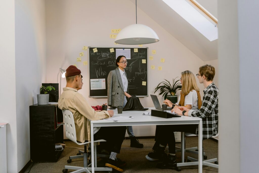 An SEO Experts Discussing SEO Consulting Service with Client .